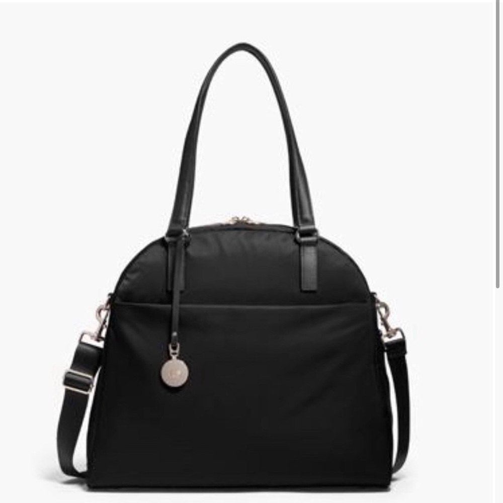 Lo & Sons OMG overnight bag. Black with purple interior.